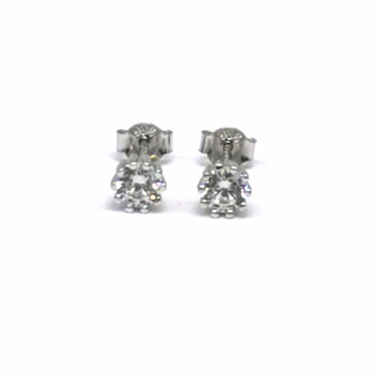 Silver white stone eight claw earrings