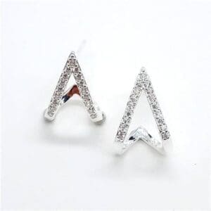 White stone V style stud earrings