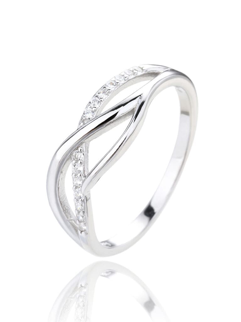 Silver ring with curved motif and white stones