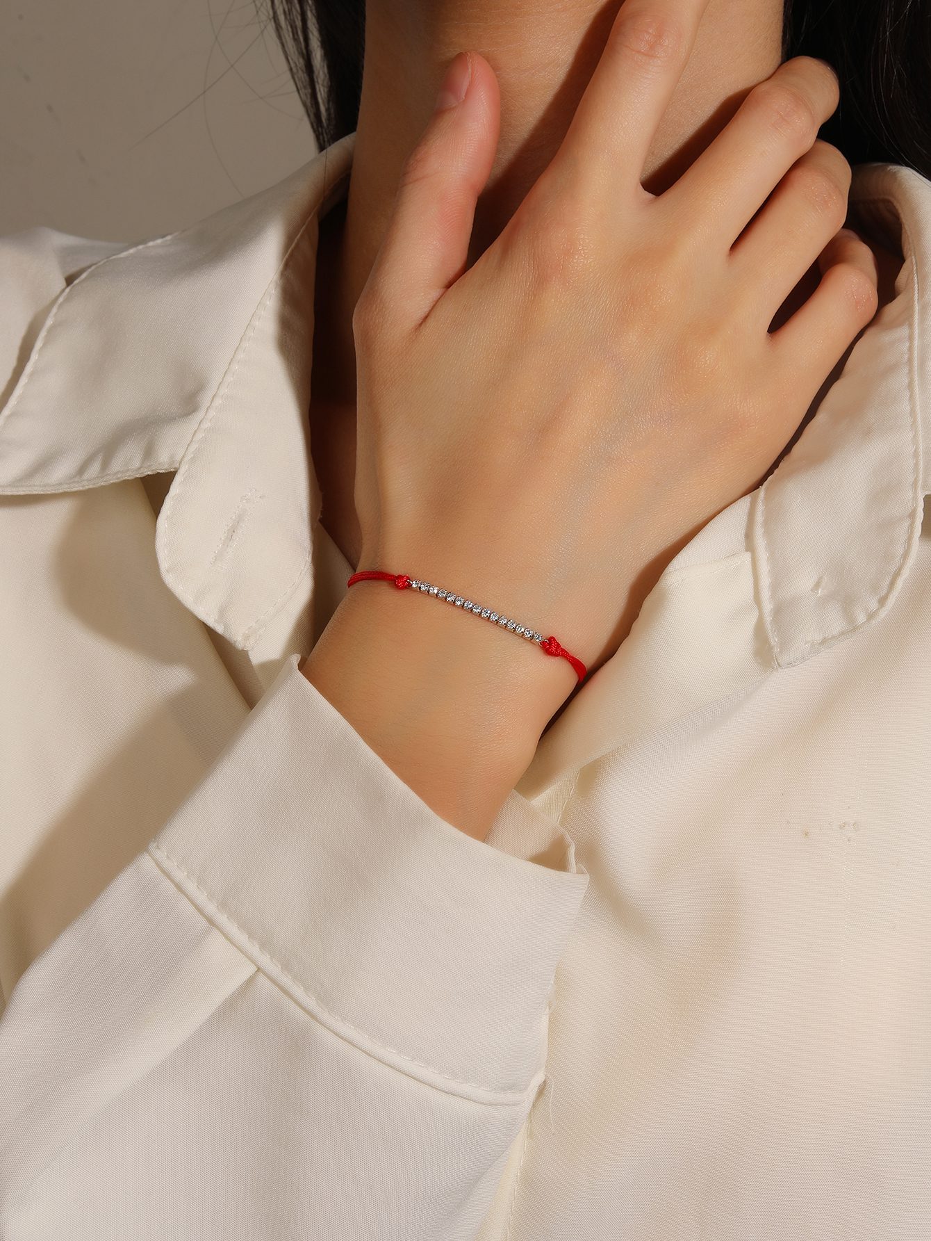 Red-threaded watch-matching bracelet with cubic zirconia embellishment 1