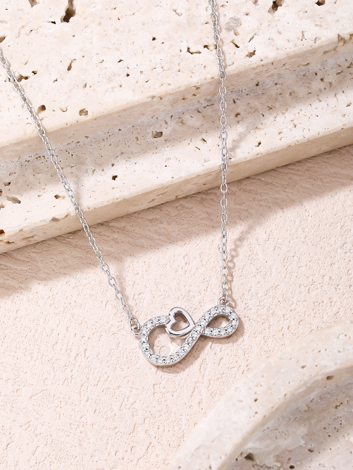 Silver necklace with infinity and heart motifs, set with cubic zirconia and rhodium-plated 2